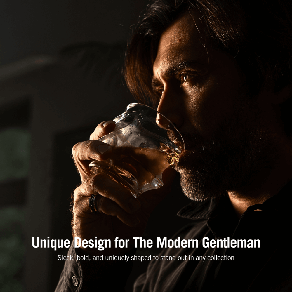 a person holding a stylish whiskey glass