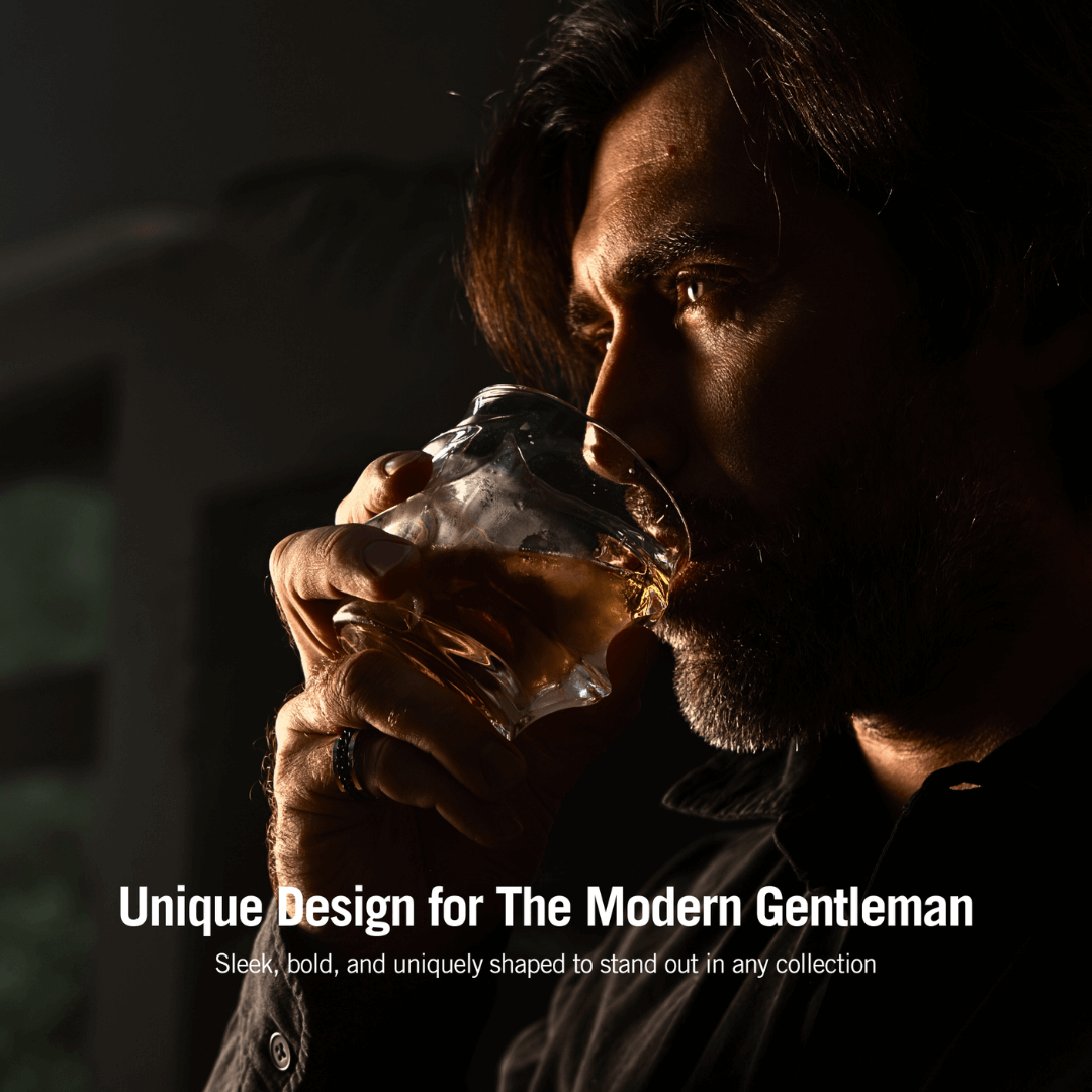 a person holding a stylish whiskey glass