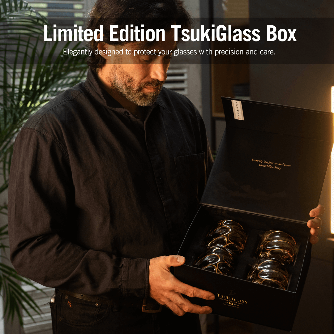 a person holds a black box containing elegant Tsuki glasses