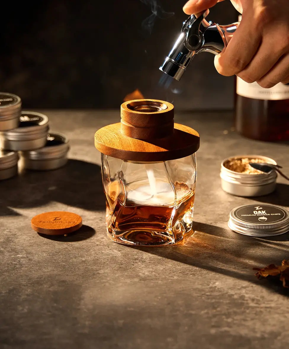Smoke infusing whisky in a Gold Hoshi glass
